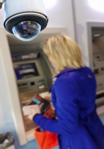 closeup on security CCTV camera or surveillance system in local cash dispenser