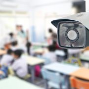 CCTV Security monitoring student in classroom at school.Security camera surveillance for watching and protect group of children while studying.