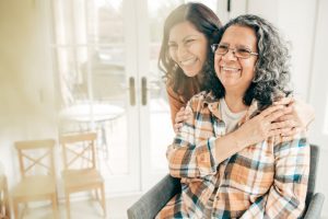 Elderly mother and daughter at home